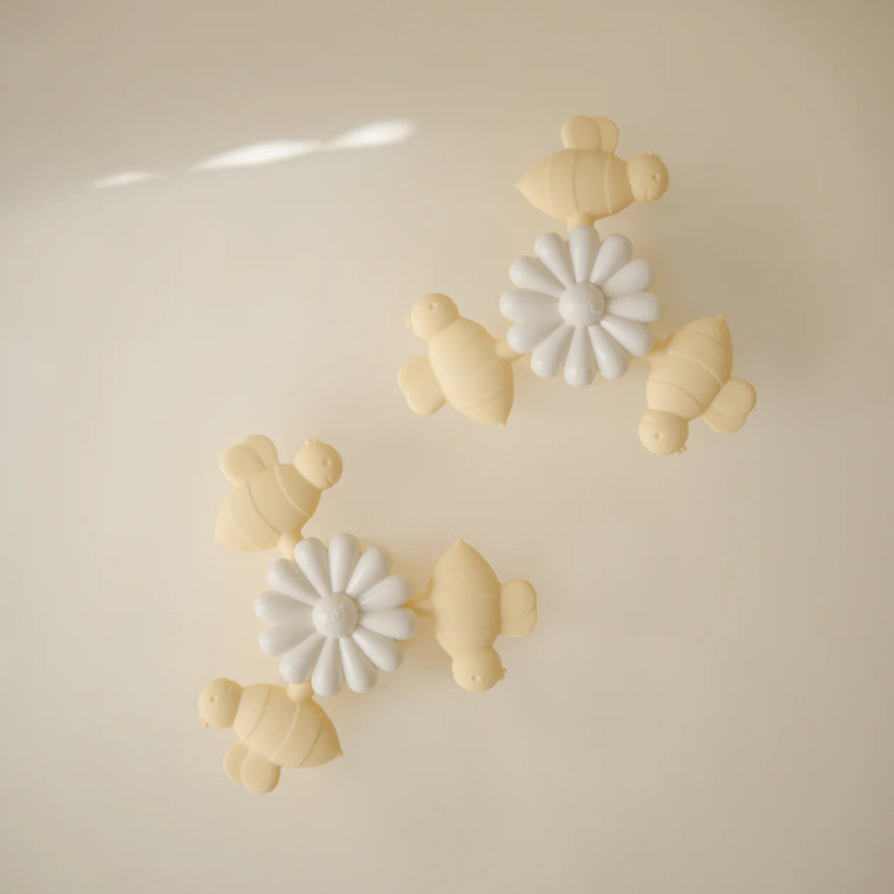 Mushie spinner bij